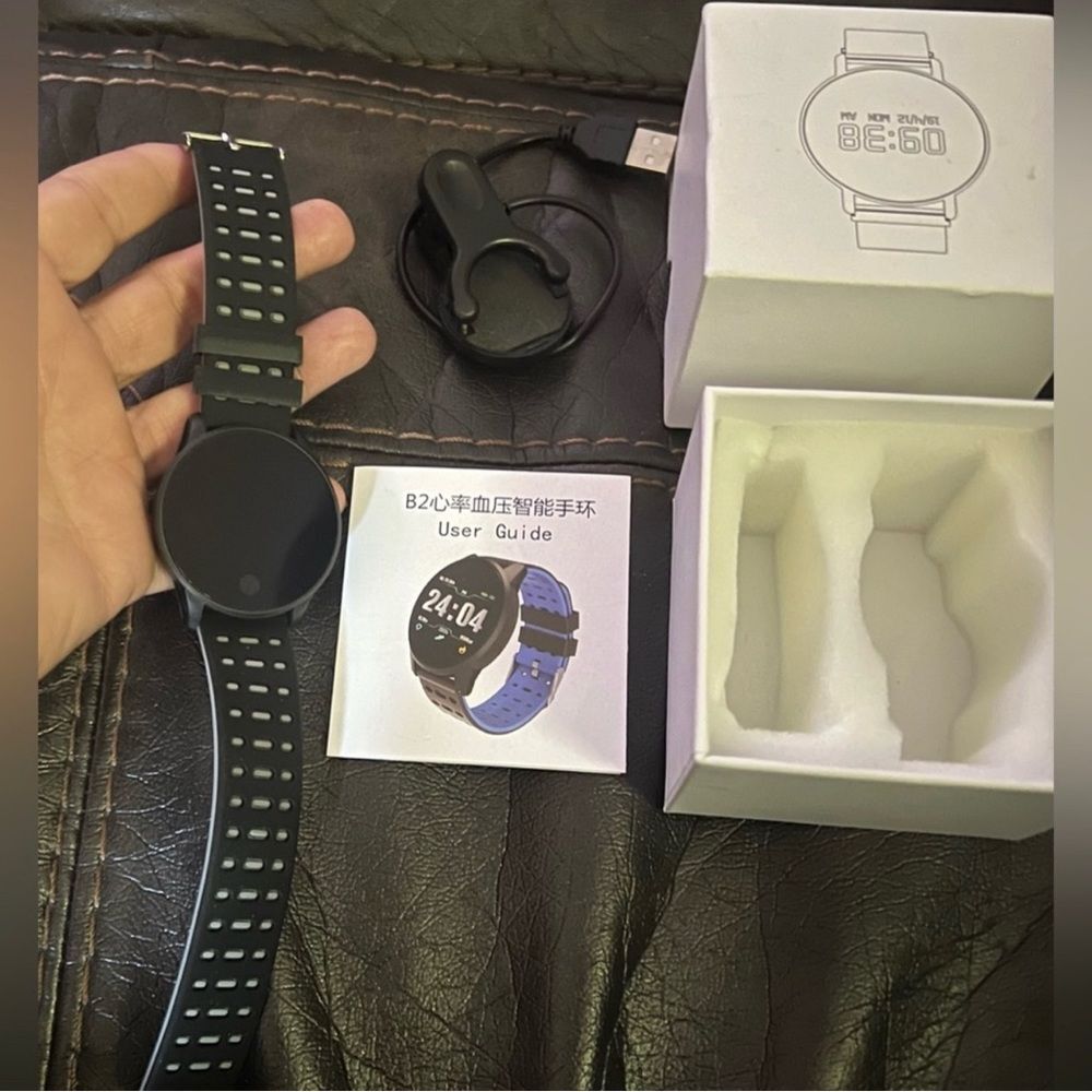 New in box smart watch with charger